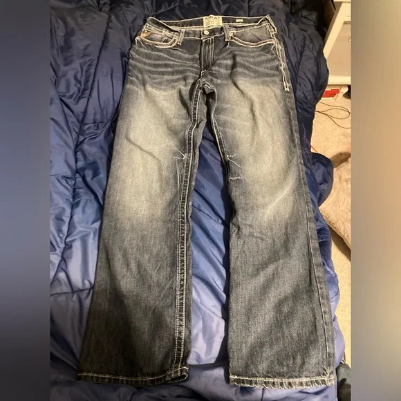 Selling Ariat Relaxed Bootcut jeans for $90. Size is 34x34.
